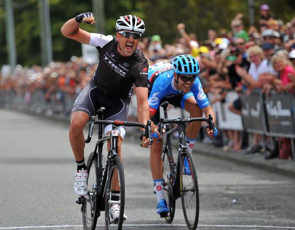 Hayden Roulston celebrates victory over Jack Bauer in the Calder Stewart Elite National Road Cycling Championships in Christchurch today.